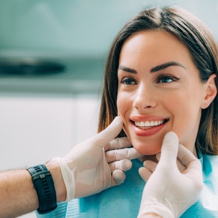 Patient having smile checked by dentist