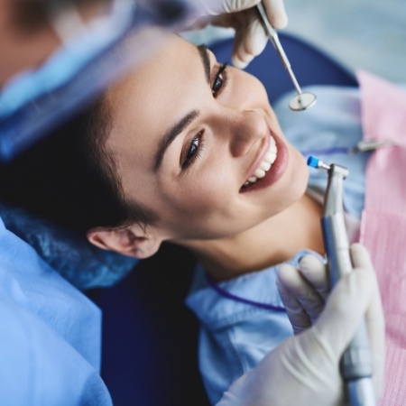 Woman having teeth cleaned for preventive dentistry in Port Orange